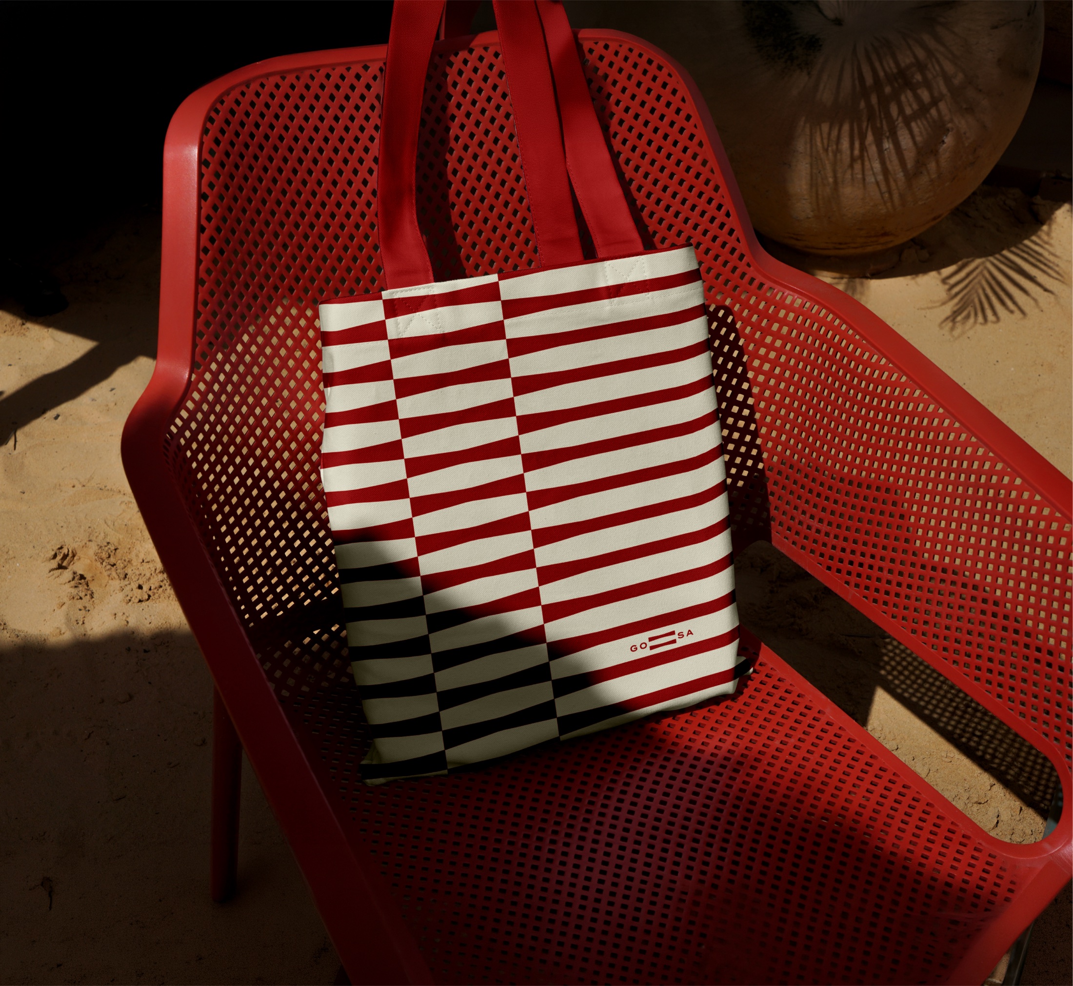 GOSA visual identity — bags on chair